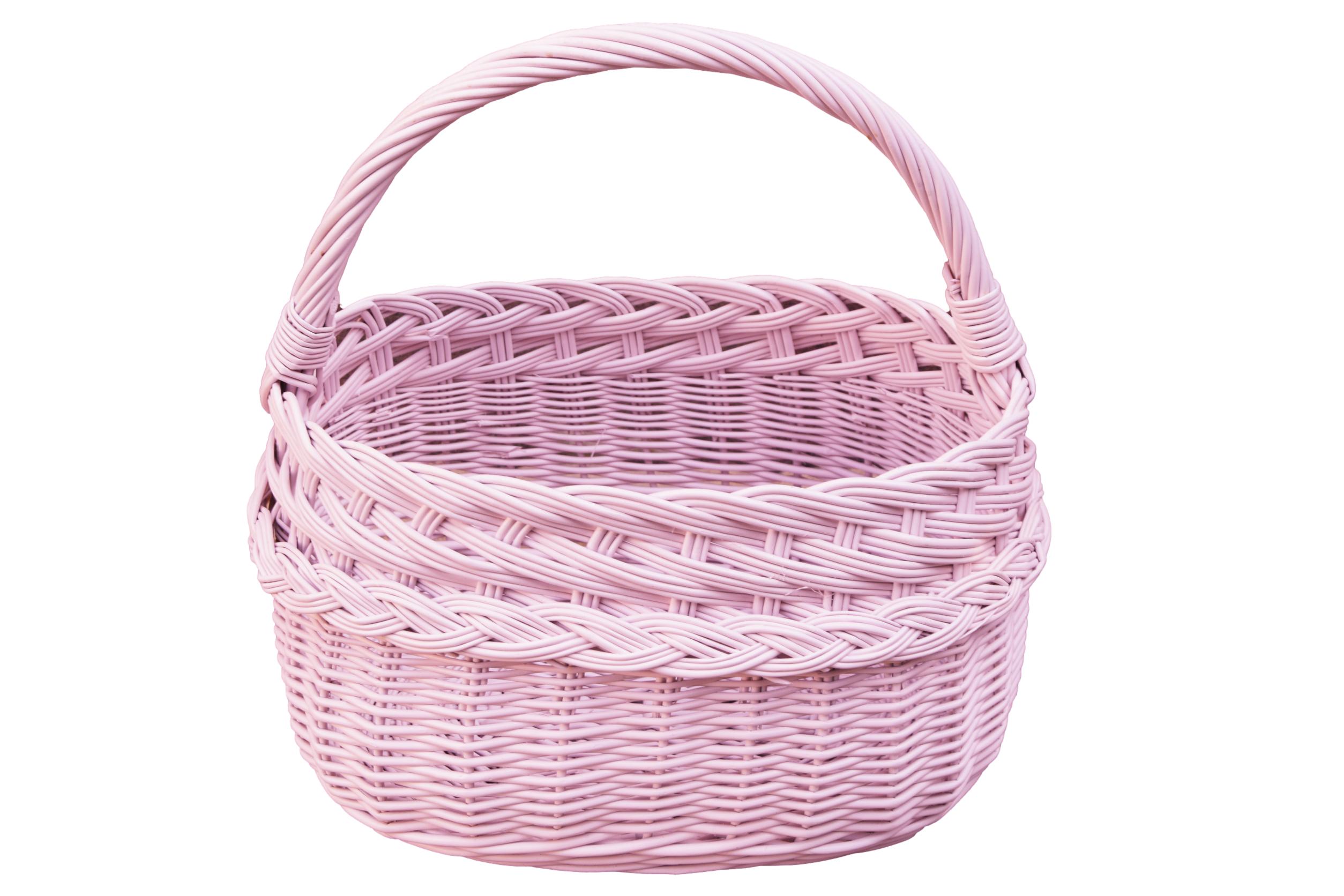 Różowy koszyk wiklinowy na zakupy